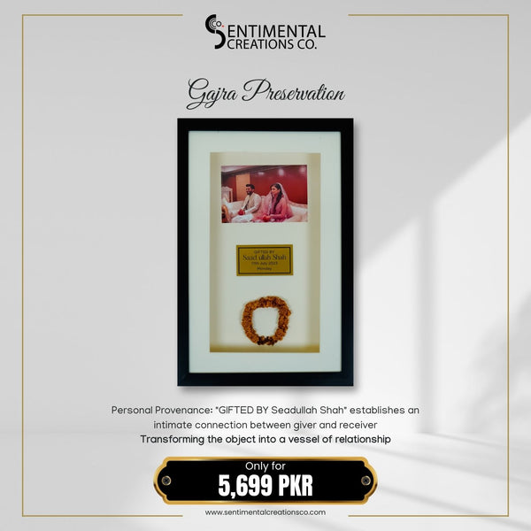 Framed photo with a wreath and text on a white background, featuring 'Sentimental Creations Co.'