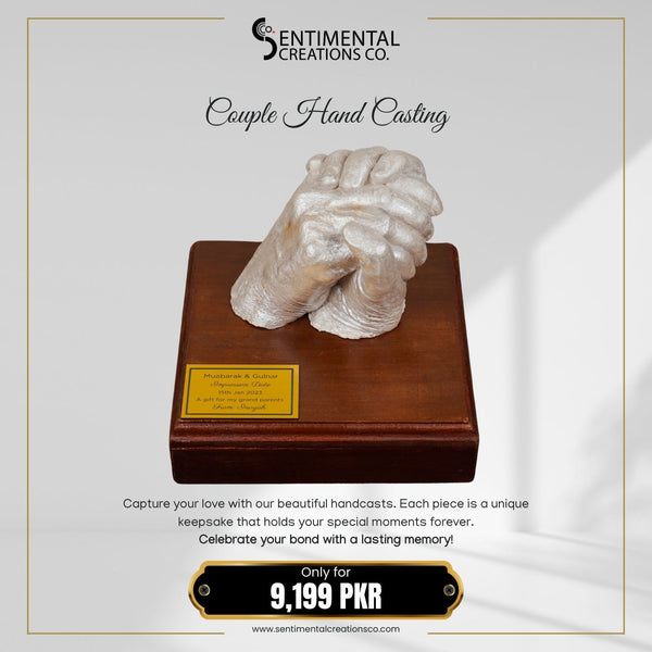 Hand-cast sculpture on a wooden base with 'Sentimental Creations Co.' branding.