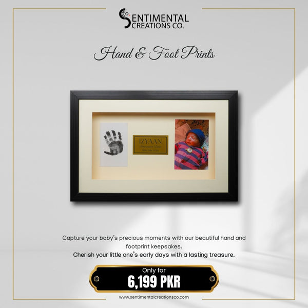 Framed hand and footprint keepsake with a baby photo, branded 'Sentimental Creations Co.'