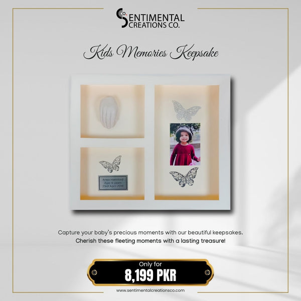 Advertisement for 'Kids Memories Keepsake' by Sentimental Creations Co. with a framed photo and handprint.
